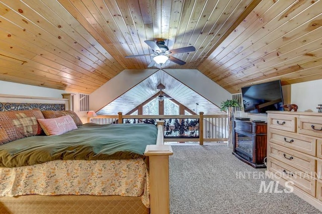 carpeted bedroom with wooden ceiling and lofted ceiling