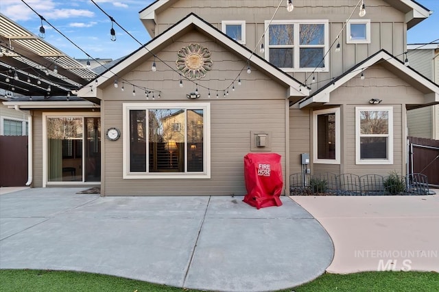 back of property featuring a patio