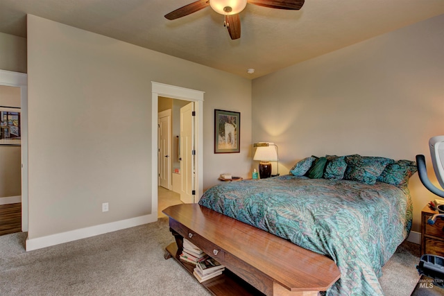 carpeted bedroom featuring ceiling fan