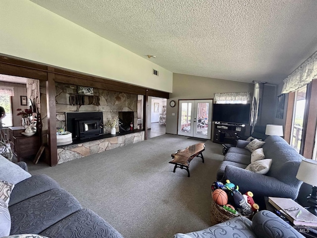 170 Red Fir Rd, Kooskia, ID 83539 - carpeted living room with lofted ceiling, a textured ceiling, and french doors