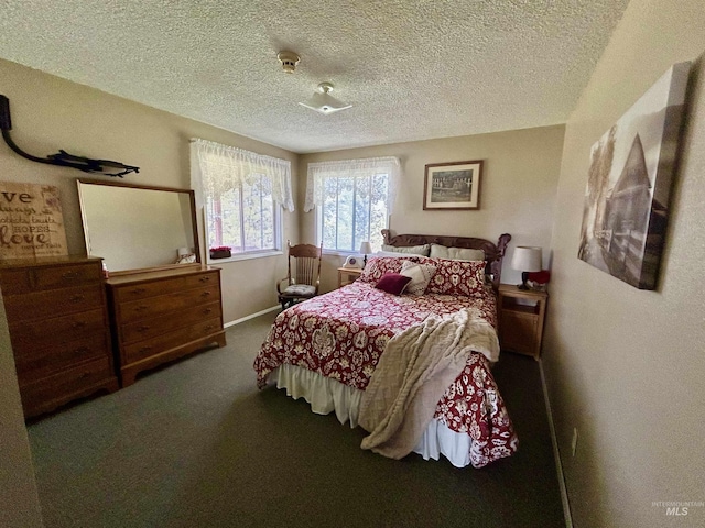 170 Red Fir Rd, Kooskia, ID 83539 - carpeted bedroom featuring a textured ceiling and baseboards