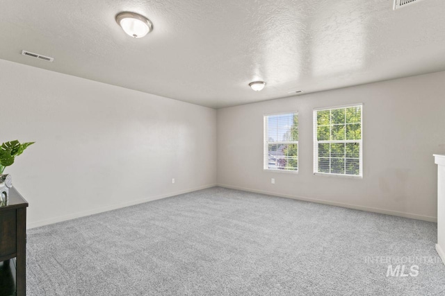 4249 W Farlam Dr, Meridian, ID 83642 - carpeted empty room featuring a textured ceiling and baseboards