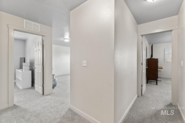 4249 W Farlam Dr, Meridian, ID 83642 - hallway with carpet and baseboards