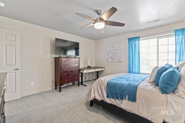 4249 W Farlam Dr, Meridian, ID 83642 - bedroom featuring carpet floors, baseboards, and a ceiling fan
