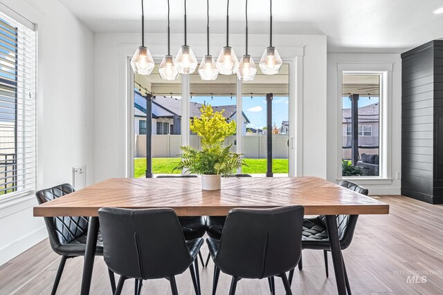 2398 N Klemmer Ave, Kuna, ID 83634 - dining space featuring light wood-type flooring and baseboards