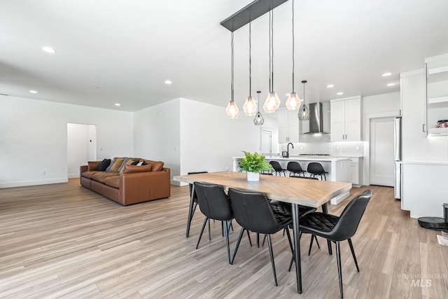 2398 N Klemmer Ave, Kuna, ID 83634 - dining area featuring light wood finished floors and recessed lighting
