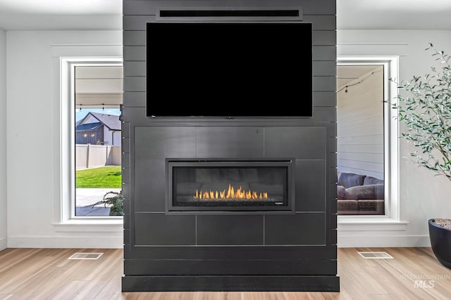 2398 N Klemmer Ave, Kuna, ID 83634 - detailed view of wood finished floors and a fireplace