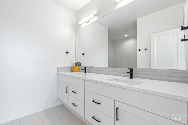 2398 N Klemmer Ave, Kuna, ID 83634 - bathroom featuring double vanity, tile patterned flooring, and recessed lighting