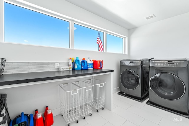2398 N Klemmer Ave, Kuna, ID 83634 - washroom with separate washer and dryer and tile patterned flooring
