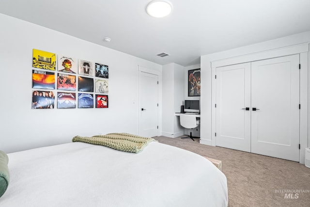 2398 N Klemmer Ave, Kuna, ID 83634 - bedroom featuring light carpet, a desk, and a closet