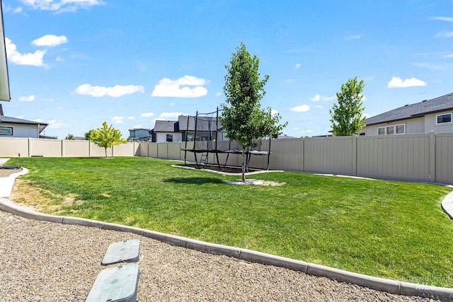 2398 N Klemmer Ave, Kuna, ID 83634 - fenced backyard featuring a trampoline