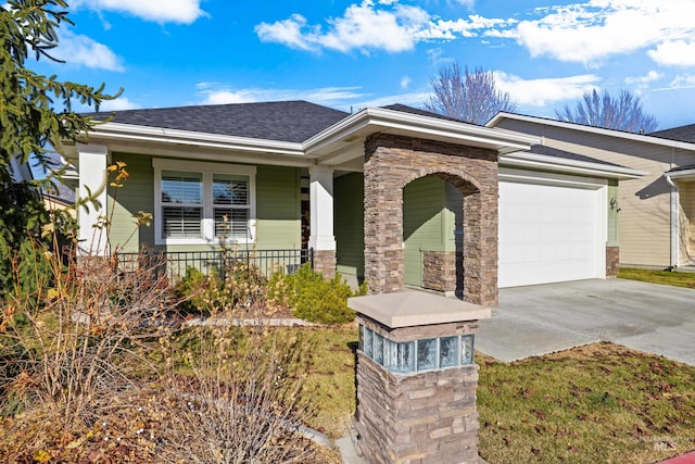 view of front of house featuring a porch and a garage