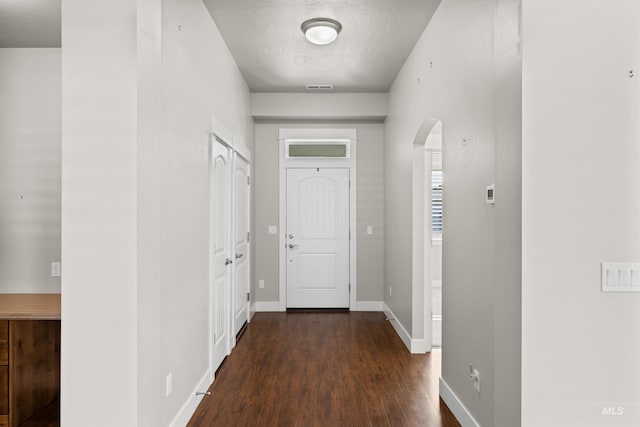 foyer featuring dark hardwood / wood-style flooring