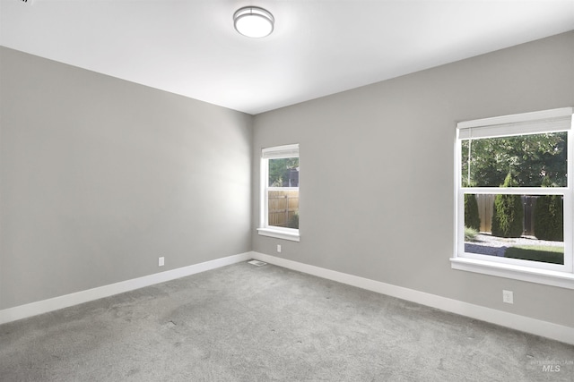 680 E 19th St, Burley, ID 83318 - carpeted spare room featuring healthy amount of natural light and baseboards