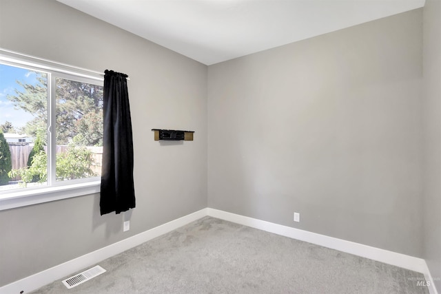 680 E 19th St, Burley, ID 83318 - unfurnished room with light carpet, baseboards, and healthy amount of natural light