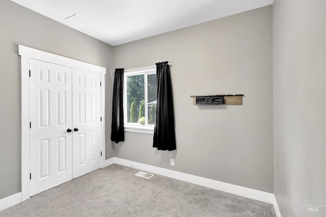680 E 19th St, Burley, ID 83318 - unfurnished bedroom featuring carpet floors, baseboards, and a closet