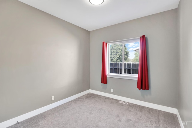 680 E 19th St, Burley, ID 83318 - spare room featuring baseboards and carpet flooring