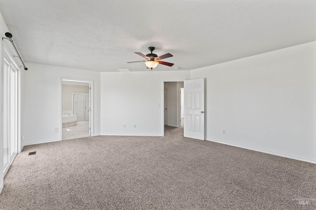 1992 S Elkhound Ave, Meridian, ID 83642 - empty room featuring a ceiling fan, carpet flooring, and baseboards