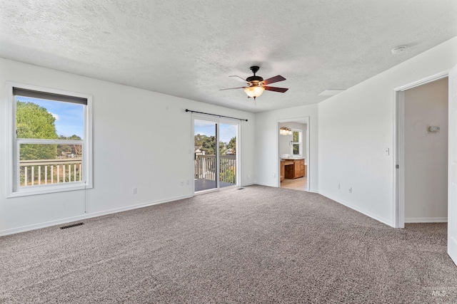 1992 S Elkhound Ave, Meridian, ID 83642 - carpeted empty room with ceiling fan, a textured ceiling, baseboards, and a smoke detector