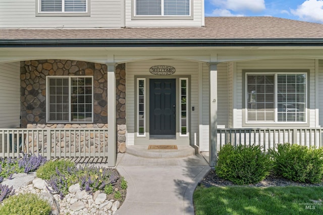 1992 S Elkhound Ave, Meridian, ID 83642 - entrance to property featuring a porch and roof with shingles
