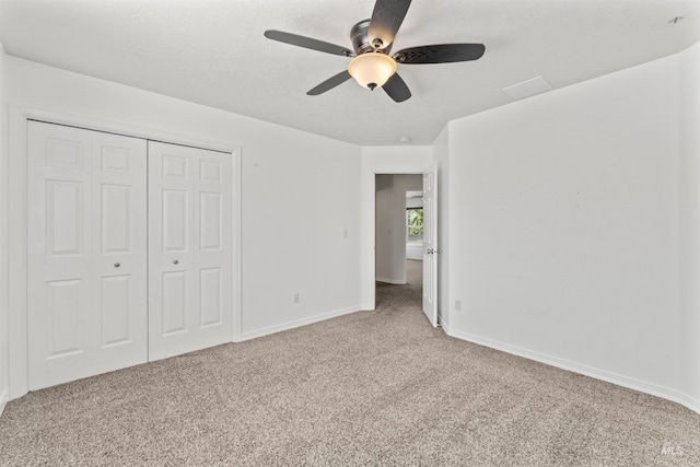 1992 S Elkhound Ave, Meridian, ID 83642 - unfurnished bedroom with carpet floors, baseboards, a closet, and ceiling fan
