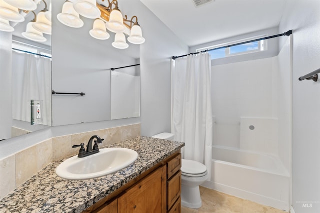 1992 S Elkhound Ave, Meridian, ID 83642 - bathroom featuring toilet, vanity, shower / bath combo with shower curtain, and tile patterned floors