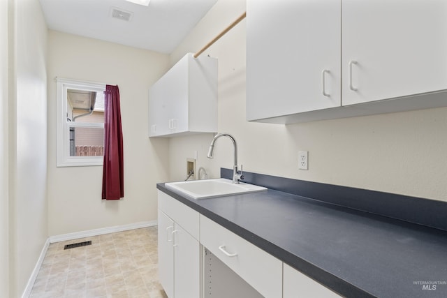 1992 S Elkhound Ave, Meridian, ID 83642 - laundry area with cabinet space, washer hookup, and baseboards