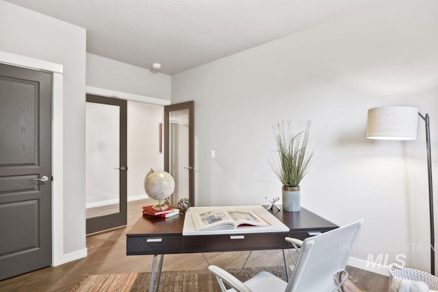 office area featuring hardwood / wood-style flooring