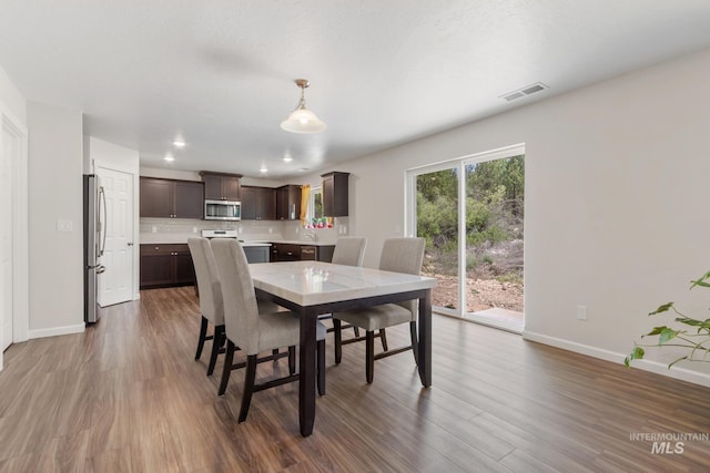 207 Lainey Ln, Idaho City, ID 83631 - dining space with wood finished floors and recessed lighting