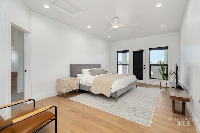 bedroom with access to outside, ceiling fan, and light hardwood / wood-style flooring