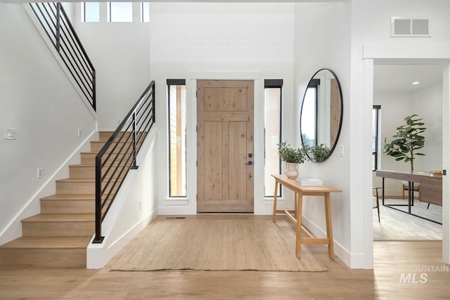 foyer entrance featuring light hardwood / wood-style floors