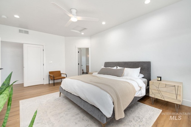 bedroom featuring ceiling fan and wood-type flooring