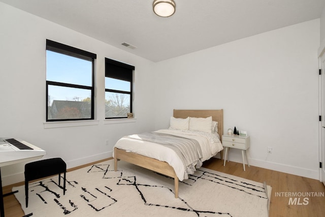 bedroom featuring light hardwood / wood-style flooring