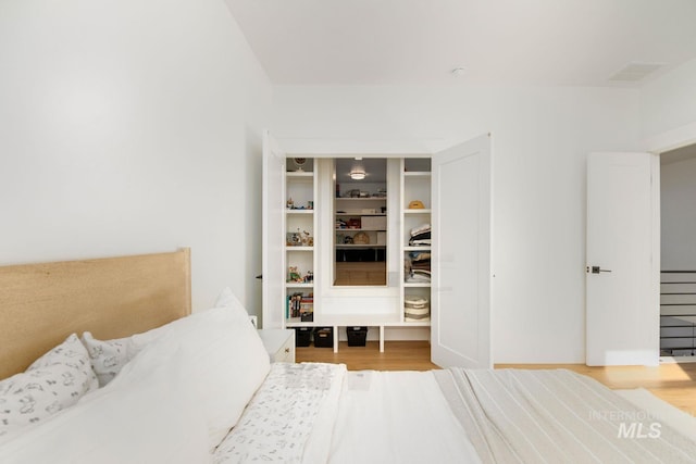 bedroom featuring light hardwood / wood-style floors