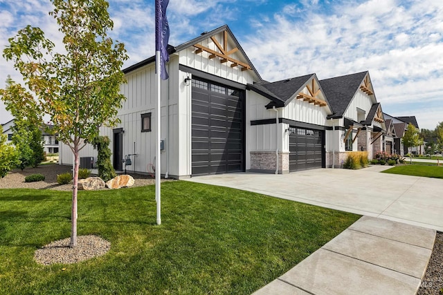 view of home's exterior with board and batten siding, a garage, driveway, a lawn, and a residential view