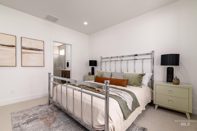 bedroom with visible vents, ensuite bathroom, recessed lighting, carpet floors, and baseboards