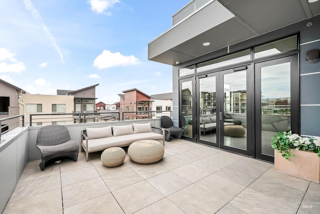 view of patio featuring a balcony