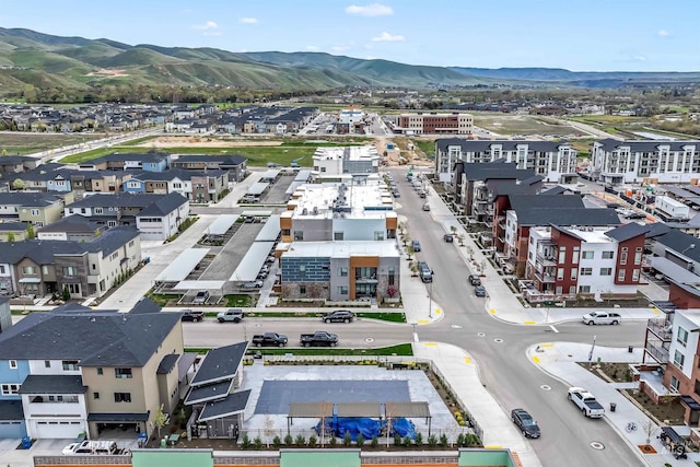 aerial view featuring a mountain view and a residential view