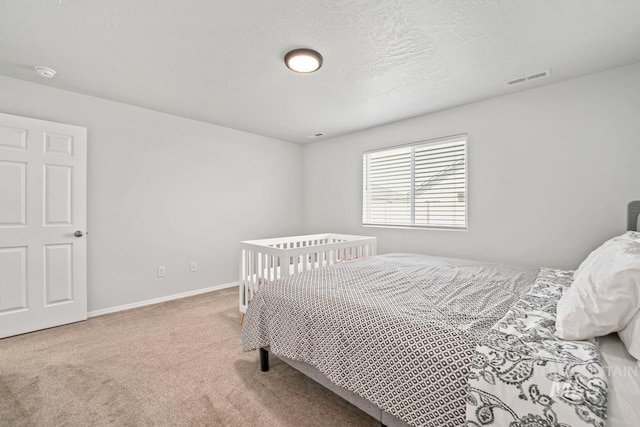 12740 Abbeygate Dr, Nampa, ID 83651 - carpeted bedroom with baseboards