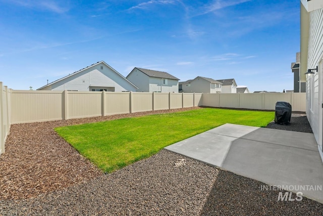 12740 Abbeygate Dr, Nampa, ID 83651 - fenced backyard with a patio area and a residential view