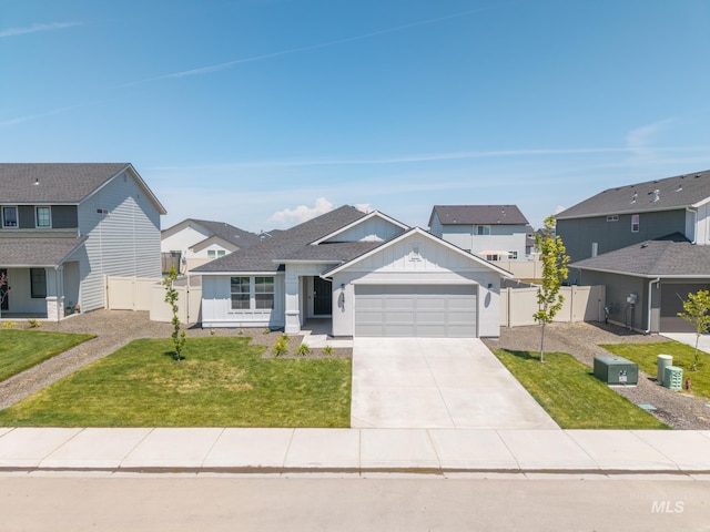 12740 Abbeygate Dr, Nampa, ID 83651 - view of front of property with an attached garage, concrete driveway, board and batten siding, and a residential view