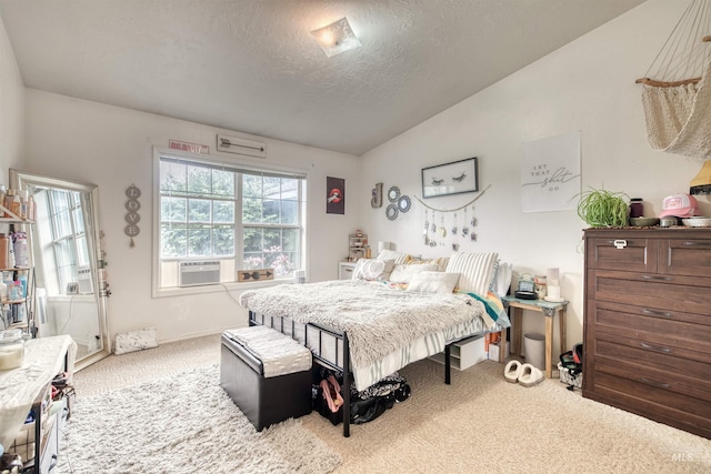 1921 Arcata Way, Ontario, OR 97914 - carpeted bedroom featuring cooling unit, a textured ceiling, and lofted ceiling