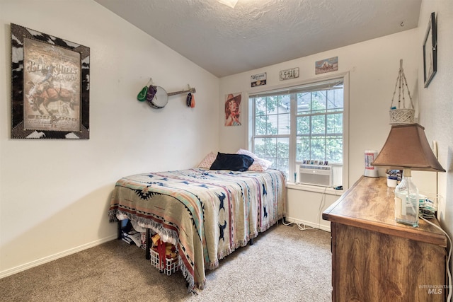 1921 Arcata Way, Ontario, OR 97914 - carpeted bedroom with lofted ceiling, cooling unit, and a textured ceiling