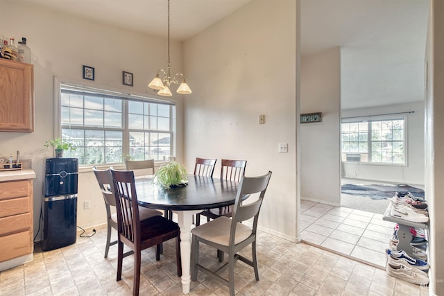 1921 Arcata Way, Ontario, OR 97914 - dining area with a chandelier and high vaulted ceiling