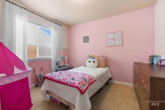 bedroom with light carpet