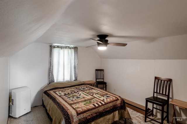 bedroom featuring ceiling fan and vaulted ceiling