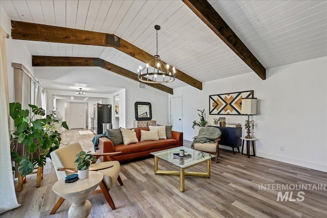 15103 Castle Way, Caldwell, ID 83607 - living area featuring wood finished floors, a chandelier, baseboards, and wood ceiling