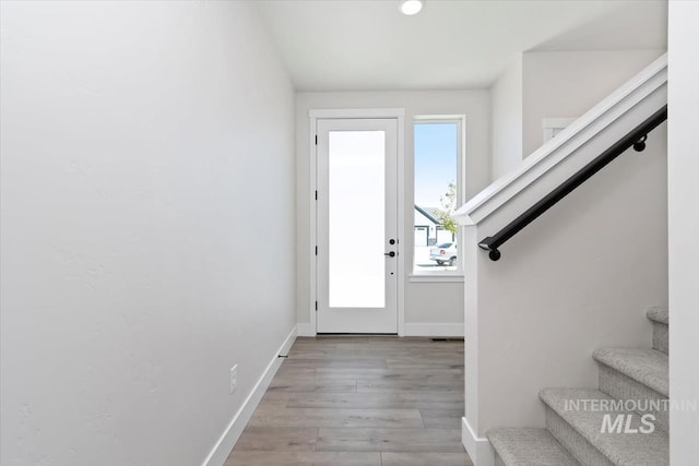 6150 S Binky Ave, Meridian, ID 83642 - doorway with stairway, baseboards, light wood finished floors, and recessed lighting