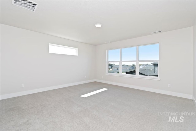 6150 S Binky Ave, Meridian, ID 83642 - spare room with carpet floors and baseboards