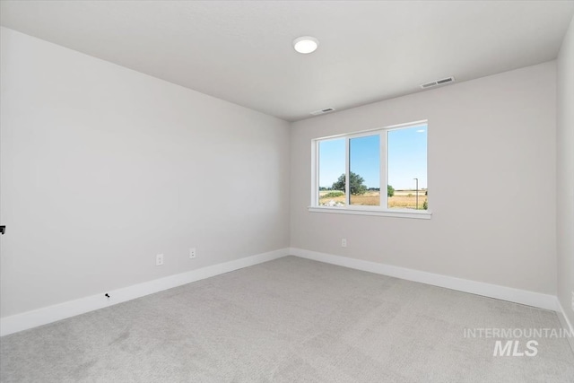 6150 S Binky Ave, Meridian, ID 83642 - unfurnished room with light colored carpet and baseboards